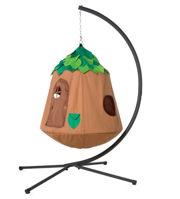 large hanging swing styled like a tree with green leaves as the roof. "Tree house" is hanging from a black metal stand